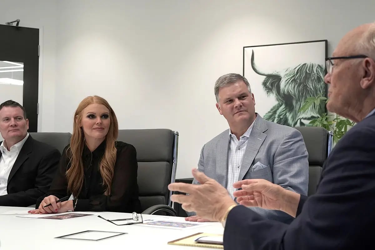 Wealth advisors during meeting in boardroom