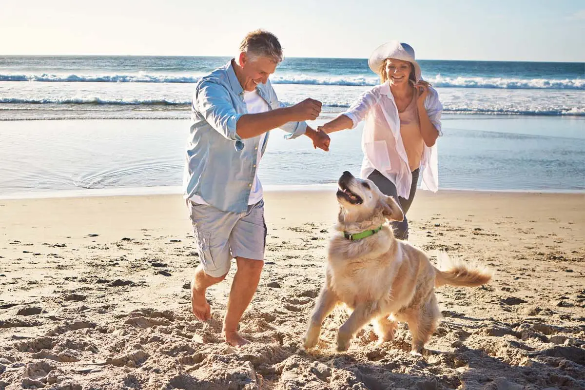 Retired couple on beach